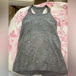 Gray lululemon swiftly tech tank top size 4